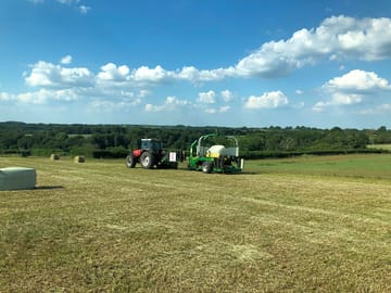 The campsite is top right beyond the copse of trees. july-aug is haymaking time.