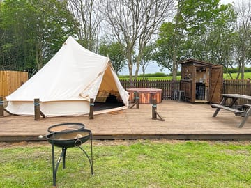 Bell tent with hot tub, picnic bench, firepit and campers' kitchen