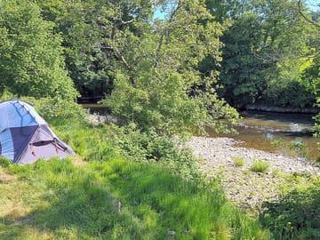 Tent next to the river