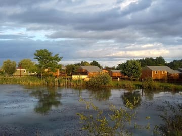 View towards the lodges from across the water