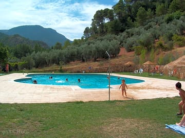 The pool overlooks the sierra de segura