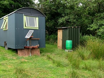 Showing composting toilet and shower building
