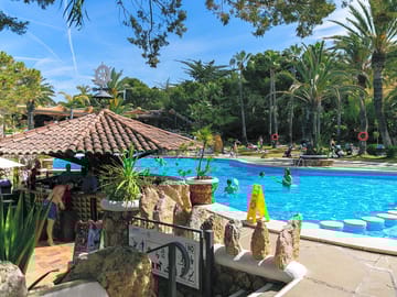 Swimming pool and pool bar