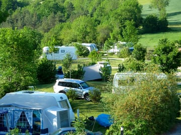 Grass pitches surrounded by nature