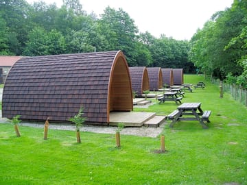 Modern glamping pods - remember to bring all your usual camping equipment!