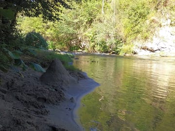 The river next to the campsite