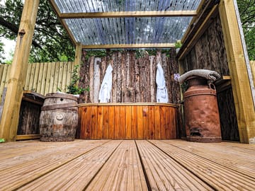 Covered outdoor bath