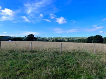 The meadow view from the bell tents