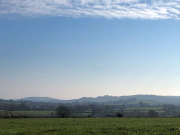 Views of surrounding fields and hills in the dorset countryside