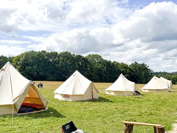 Empty bell tents in a line
