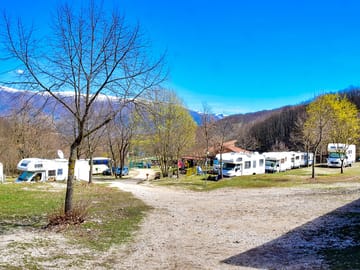 Pitches with a mountain backdrop