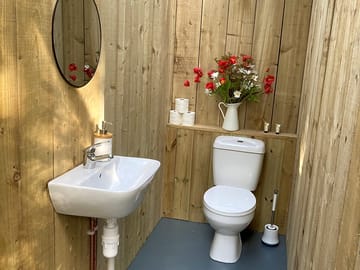 Two identical toilets on site