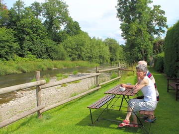 Have a drink while looking out for the kingfishers on site