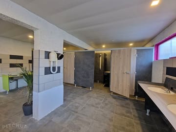 Toilet and shower block