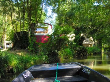 Gypsy caravan, as seen from the river