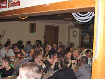 Campers enjoying a meal together