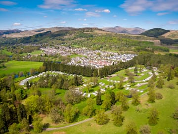 Aerial view of Callander Woods, with Callander and the Trossachs in the background