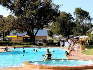 The swimming pool with a Jacuzzi corner
