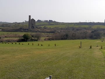 Non-electric camping field with views of an old tin mine