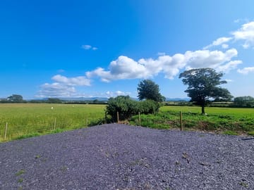 Sheep grazing in surrounding fields