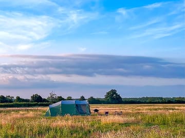 Our camping meadow is quiet and secluded, with only a handful of pitches and panoramic views.