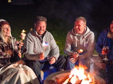 Each tent has its own firepit for toasting your complimentary marshmallows