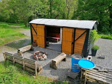 Enjoy using our communal firepit / bbq and railway carriage during your stay!!