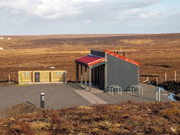 The facility block with moorland backdrop