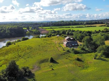 Another aerial view of the farm and lake