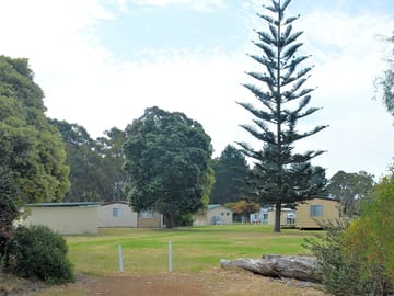 Pitches with cottages in the background
