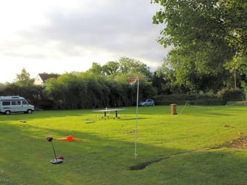 Table tennis, badminton, swings/slide and large trampoline on site