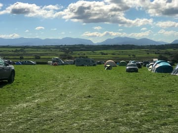 Arrive and select your pitch overlooking snowdonia