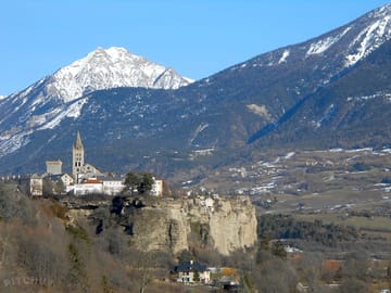 Embrun's village and church with mountains