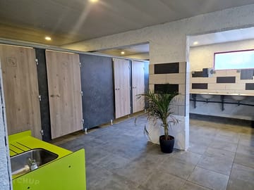 Toilet and shower block