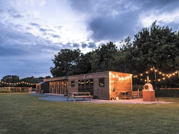 The kitchen and pizza oven in the glamping field