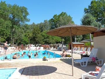 Relax by the swimming pool