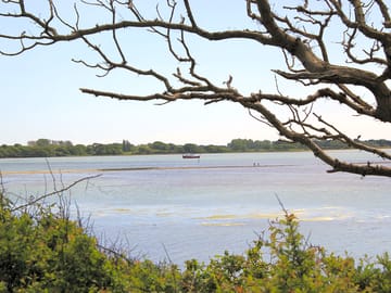View from the campsite across chichester harbour at high tide