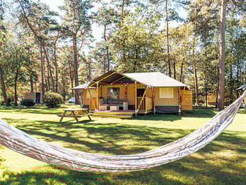 Exterior 7-person safari tent with sanitation facilities