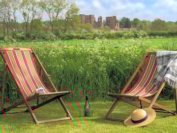 Deckchairs on the lawn with views of kenilworth castle