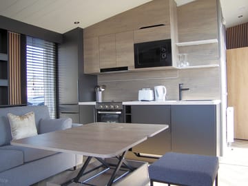 Lounge area with dining table placed