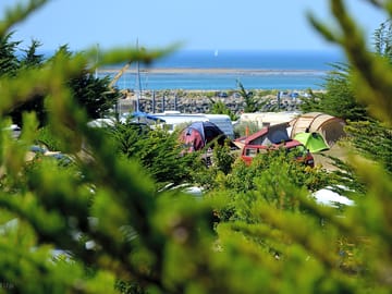 View of the camping pitches and the sea