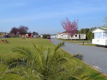 View overlooking the grass touring pitches from the rear of the site