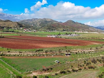Aerial shot showing mountain and river scenery