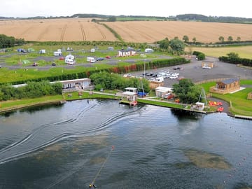Aerial view of the site and lake