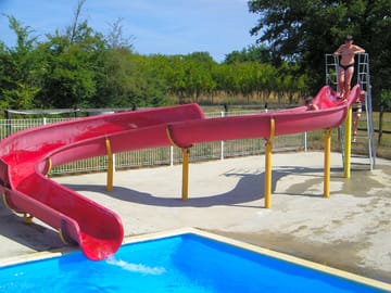 Outdoor pool with waterslide
