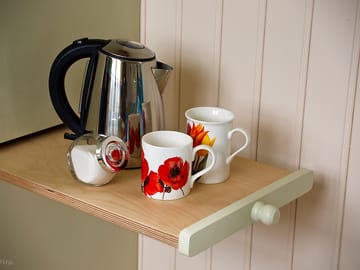 The pull-out table by the kitchenette area