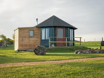 Hexagonal kitchen attached to the yurt