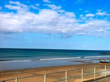 Neptune hall caravan park is situated right on the beach with panoramic views of the cardigan bay.