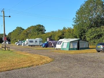 Fully-serviced hardstanding and grass pitch
