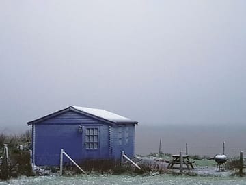 Snowy day by the sea